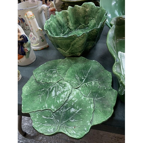 254 - SEVEN ITEMS OF GREEN CERAMIC WARE TO INCLUDE A LARGE SERVING DISH AND A BOWL AND PLATTER IN THE FORM... 