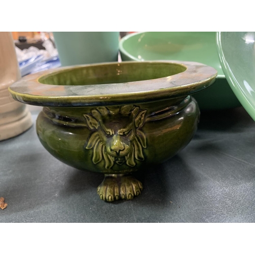 254 - SEVEN ITEMS OF GREEN CERAMIC WARE TO INCLUDE A LARGE SERVING DISH AND A BOWL AND PLATTER IN THE FORM... 