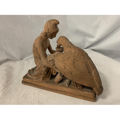 79 - A TERRACOTTA FIGURINE IN THE FORM OF AN EAGLE ZEUS AND GREEK GOD GANYMEDE  (A/F) H:19CM