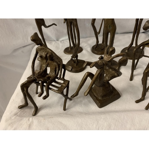 81 - A GROUP OF TEN BRONZE FIGURINES IN THE ABSTRACT FORM