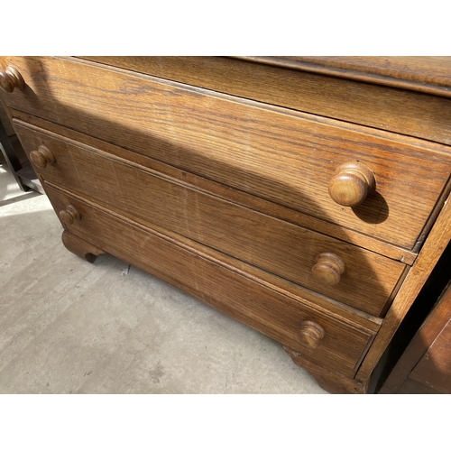 2076 - AN EARLY 20th CENTURY OAK CHEST OF THREE DRAWERS 36