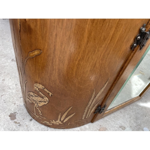 2095 - AN EARLY 20th CENTURY MIRRORED BATHROOM CABINET WITH APPLIED BIRDS AND FLORAL DECORATION 22