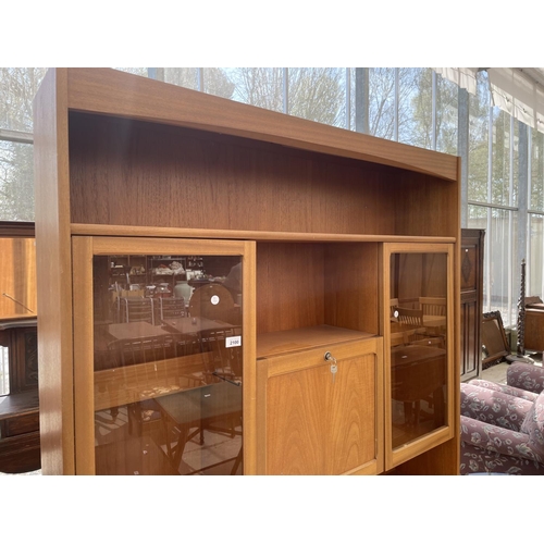 2100 - A RETRO 'NATHAN' TEAK LOUNGE UNIT ENCLOSING FOUR DRAWERS WITH THREE CUPBOARDS BELOW, THE UPPER PORTI... 