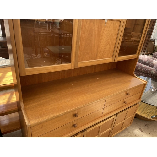 2100 - A RETRO 'NATHAN' TEAK LOUNGE UNIT ENCLOSING FOUR DRAWERS WITH THREE CUPBOARDS BELOW, THE UPPER PORTI... 