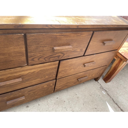 2102 - A MODERN OAK EFFECT CHEST OF SEVEN DRAWERS, 51