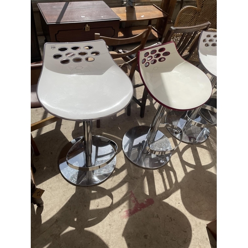 2109 - FOUR MODERN KITCHEN BAR STOOLS WITH CHROMIUM PLATED BASES AND FOOT RESTS (SOME CRACKING TO SEATS)