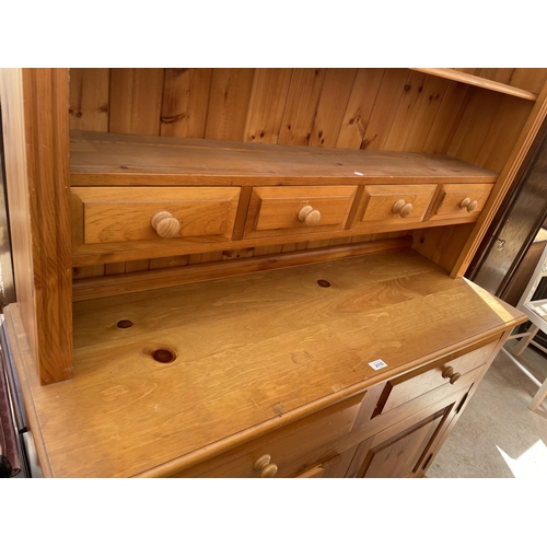 2115 - A MODERN PINE DRESSER COMPLETE WITH PLATE RACK, 48