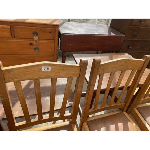 2134 - A SET OF FOUR EARLY 20TH CENTURY LIGHT OAK DINING CHAIRS ON BARLEYTWIST LEGS