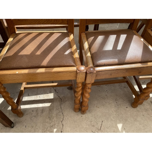 2134 - A SET OF FOUR EARLY 20TH CENTURY LIGHT OAK DINING CHAIRS ON BARLEYTWIST LEGS