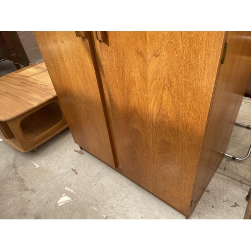 2151 - A RETRO TEAK TWO DOOR BEAUTILITY WARDROBE W: 36 INCHES