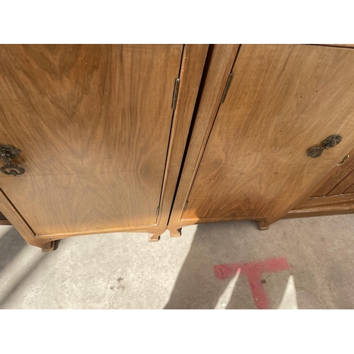 2178 - A PAIR OF MID 20TH CENTURY WALNUT BEDSIDE LOCKERS