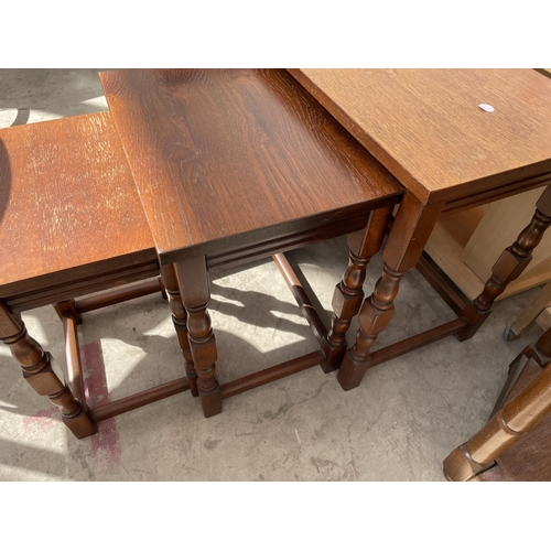 2181 - A NEST OF THREE OAK TABLES AND SMALL DRAWER CHEST