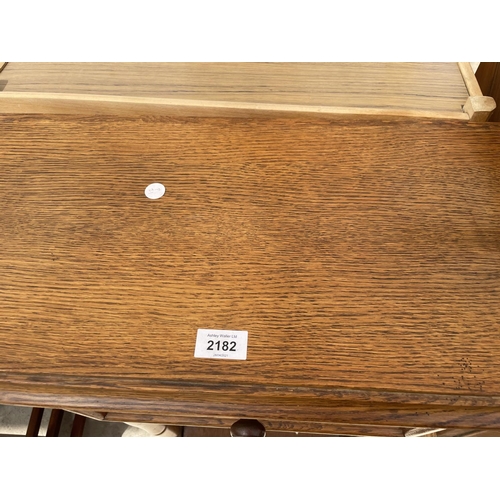 2182 - A SMALL MODERN OAK HALL TABLE ON TURNED LEGS