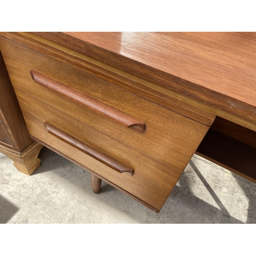 2184 - A RETRO TEAK 'WILLIAM LAWRENCE' DRESSING TABLE ENCLOSING FOUR DRAWERS, 60