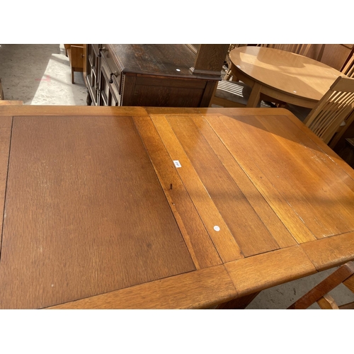 2187 - A MID 20TH CENTURY OAK DROP LEAF DINING TABLE AND FOUR MATCHING CHAIRS