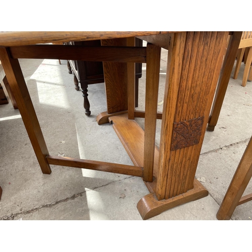 2187 - A MID 20TH CENTURY OAK DROP LEAF DINING TABLE AND FOUR MATCHING CHAIRS