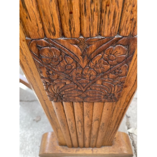 2187 - A MID 20TH CENTURY OAK DROP LEAF DINING TABLE AND FOUR MATCHING CHAIRS