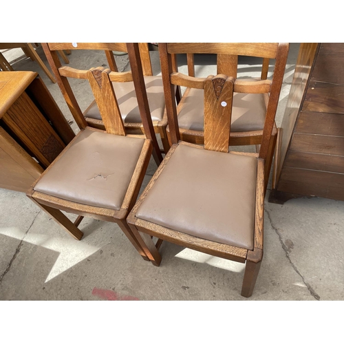 2187 - A MID 20TH CENTURY OAK DROP LEAF DINING TABLE AND FOUR MATCHING CHAIRS