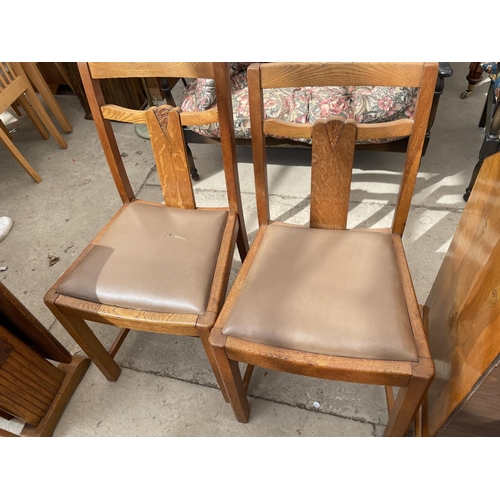 2187 - A MID 20TH CENTURY OAK DROP LEAF DINING TABLE AND FOUR MATCHING CHAIRS