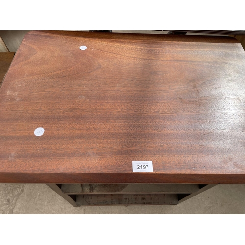 2197 - A MAHOGANY THREE TIER OCCASIONAL TABLE, 26X18