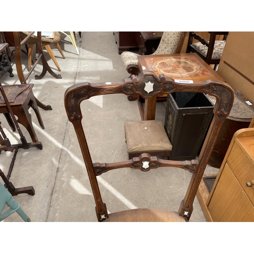 2208 - A VICTORIAN MAHOGANY BEDROOM CHAIR WITH FAUX SPLIT CANE SEAT AND BONE SHIELD APPLIED DECORATION