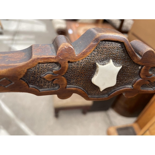 2208 - A VICTORIAN MAHOGANY BEDROOM CHAIR WITH FAUX SPLIT CANE SEAT AND BONE SHIELD APPLIED DECORATION