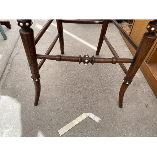 2208 - A VICTORIAN MAHOGANY BEDROOM CHAIR WITH FAUX SPLIT CANE SEAT AND BONE SHIELD APPLIED DECORATION