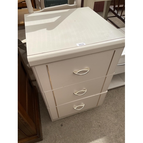 2212 - A TEAK BEDSIDE CABINET, TWO WHITE BEDSIDE CABINETS AND A WHITE BEDSIDE CHEST OF THREE DRAWERS