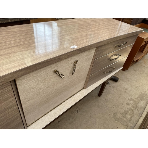 2226 - A 1970'S CREAMY WALNUT EFFECT SIDEBOARD ENCLOSING COCKTAIL SECTION, CUPBOARD AND THREE DRAWERS, 66