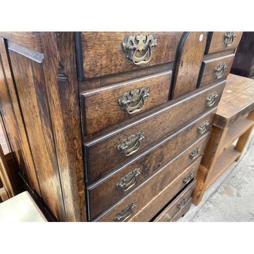 2235 - AN OAK TV/VIDEO CABINET IN THE FORM OF A GEORGIAN CHEST OF DRAWERS, 35.5