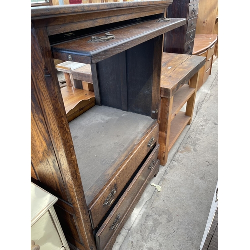 2235 - AN OAK TV/VIDEO CABINET IN THE FORM OF A GEORGIAN CHEST OF DRAWERS, 35.5