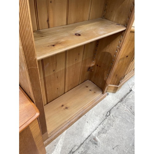 2239 - AN OPEN PINE BOOKCASE WITH DENTIL CORNICE, 39