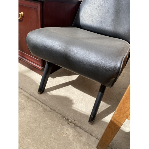 2251 - A BLACK LEATHER EFFECT FIRESIDE CHAIR