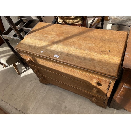 2076 - AN EARLY 20th CENTURY OAK CHEST OF THREE DRAWERS 36