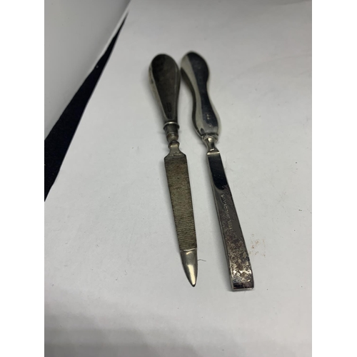 559 - FOUR SILVER ITEMS TO INCLUDE A NAIL CARE AND COMB CASE