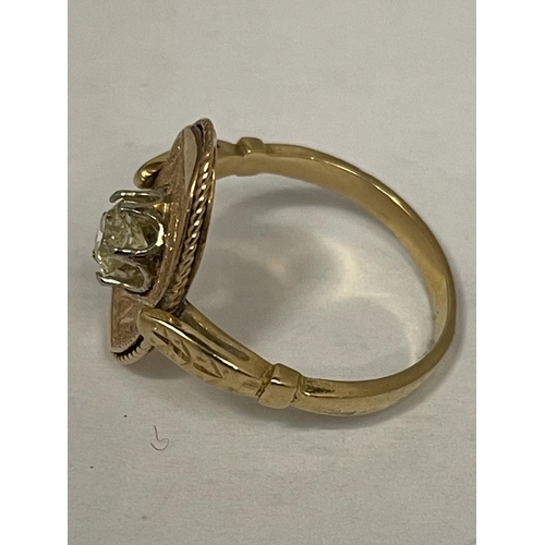 569 - A 1920'S 18 CARAT GOLD OVAL RING WITH A SINGLE DIAMOND SIZE P/Q