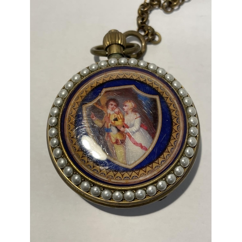 590 - A POCKET WATCH WITH AN ENAMEL AND PEARL DOUBLE SIDED CASE