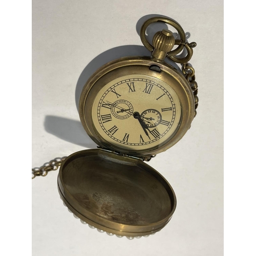 590 - A POCKET WATCH WITH AN ENAMEL AND PEARL DOUBLE SIDED CASE