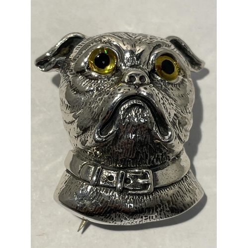 600 - A SILVER BROOCH IN THE DESIGN OF A BULLDOG WITH GLASS EYES