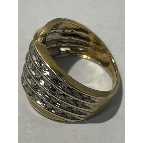 604 - A 9 CARAT YELLOW GOLD AND DIAMOND WOVEN CLUSTER RING SIZE N/O