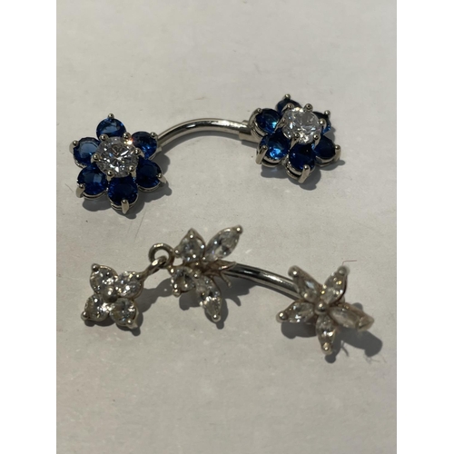 607 - TWO SILVER BELLY BUTTON BARS WITH COLOURED STONE FLOWER DESIGN