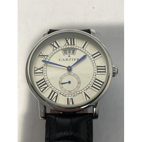 617 - A GENTLEMANS FASHION WRIST WATCH