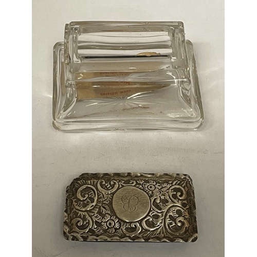 639 - A GLASS TRINKET BOX WITH AN ORNATE SILVER LID