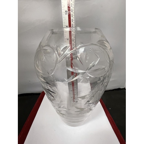 658 - A HEAVY CUT GLASS VASE