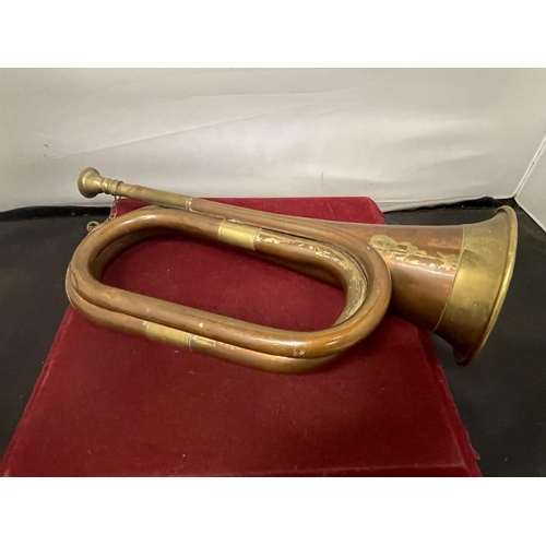 663 - A BRASS AND COPPER BUGLE