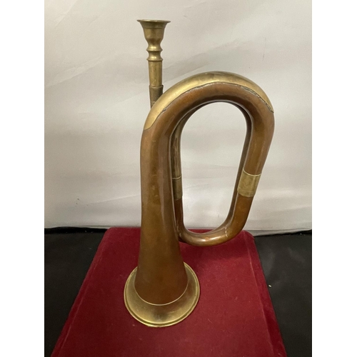 663 - A BRASS AND COPPER BUGLE