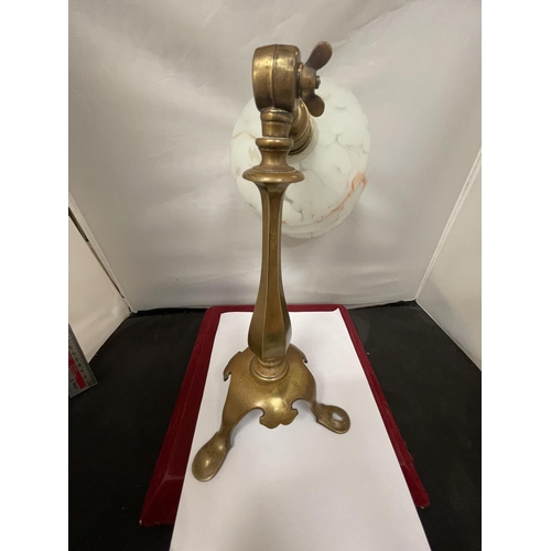 675 - A BRASS LAMP WITH SHADE