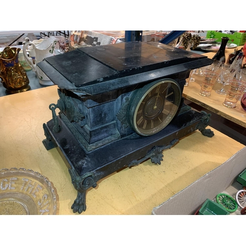 340 - A LATE 19TH CENTURY SLATE MANTEL CLOCK