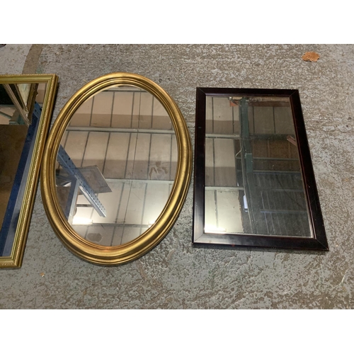 349 - TWO GILT FRAMED MIRRORS AND A FURTHER WOODEN FRAMED EXAMPLE