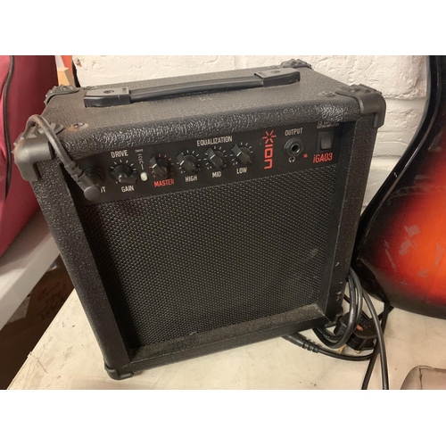 354 - AN ION ELECTRIC GUITAR WITH CARRYING CASE AND AMPLIFIER